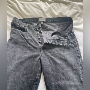 Agolde straight leg high waist, button up fly. Distress detail. Washed black.